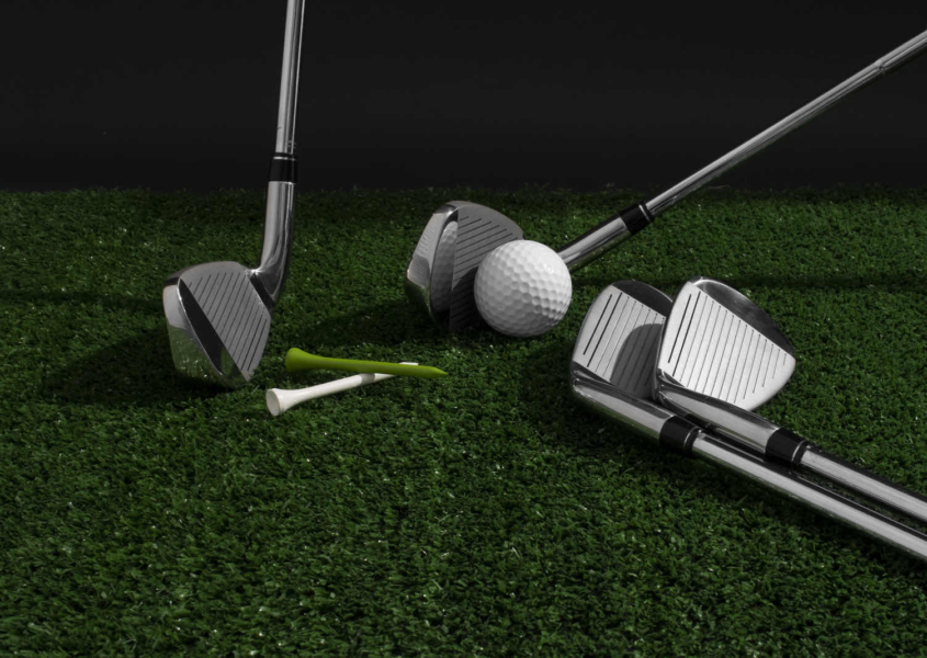 New golfer at Golf Lessons Austin Texas learning swing basics at indoor facility