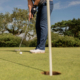 Private golf lessons session focusing on putting technique and alignment